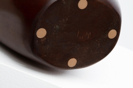 Alexandre Noll's mahogany pitcher, detailed view of signature underneath