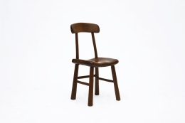 Alexandre Noll's wooden chair, front diagonal view